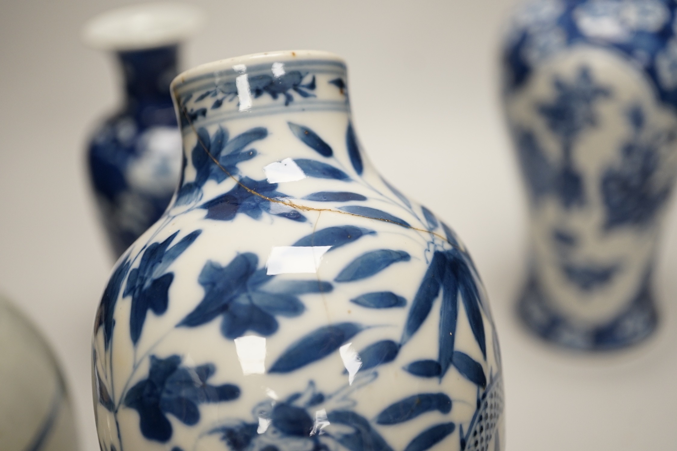 Three Chinese blue and white vases and a similar jar, 19th century, tallest 22.5 cm